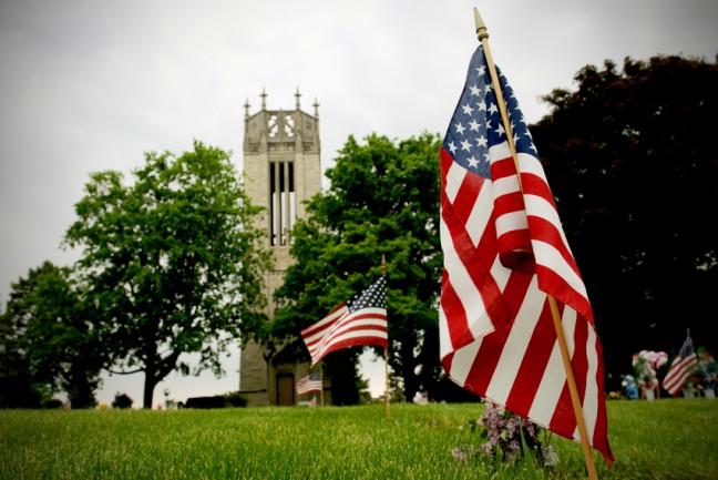 Flags placed for Memorial Day are seen near the center of Roselawn Memorial Park Cemetery in Monona on May 25, 2009.
