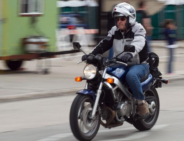 Motorcycle enthusiasts of all backgrounds ride along Capitol Square for Saturday\'s \
