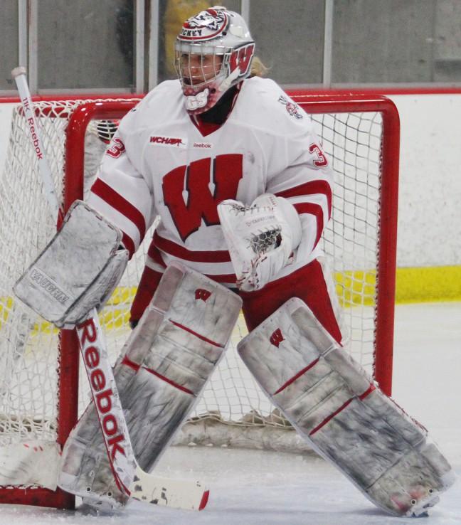 Senior Alex Rigsby stopped 23 of 24 shots to help Wisconsin to a 2-1 win over Harvard in an NCAA quarterfinal, her 100th win of her Badger career. 