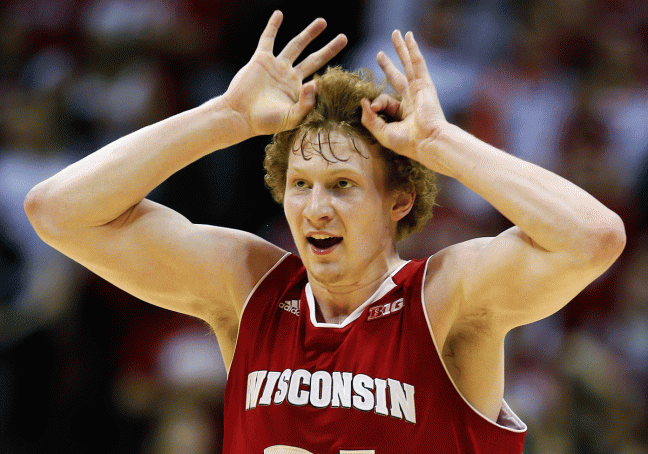 Badgers\' forward Mike Bruesewitz reacts after hitting a three-pointer that extended UW\'s lead to eight in the second half.
