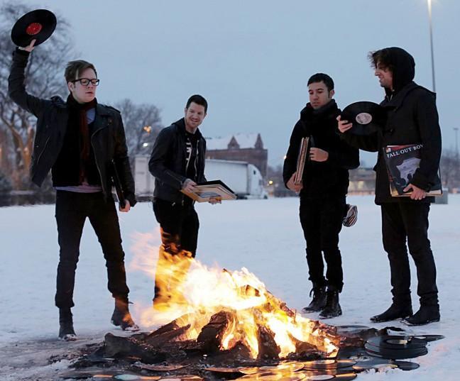 Fall Out Boy members are warming up for the release of their new album, dropping in April. The Chicago boys are remembered for their edgy lyrics and making a scene into an arms race.