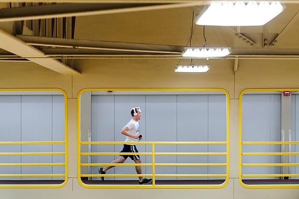 A man runs on the jogging track at the Southeast Recreation Facility at the University of Wisconsin on Nov. 2, 2013.