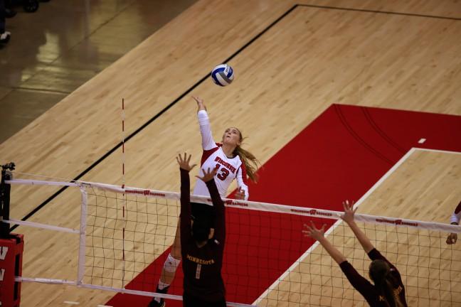 Wisconsin's Haleigh Nelson (13) tried to slow down Minnesota's Daly Santana Wednesday night at the UW Field House. 