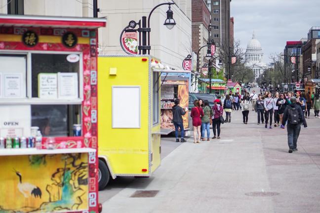 Food trucks suffer from lack of students, introduce take-out options