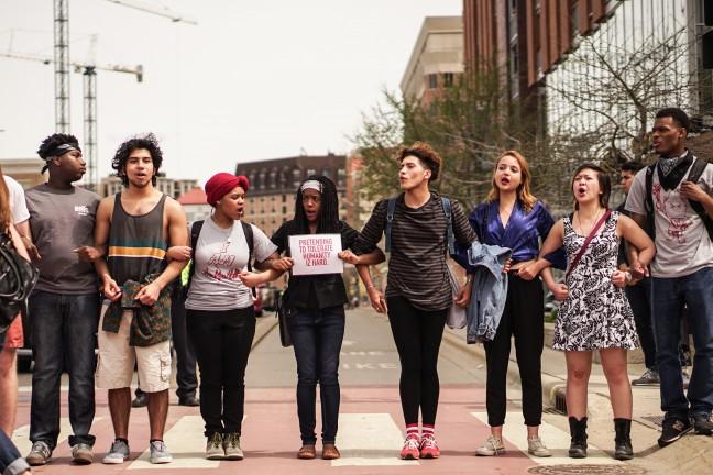 In photos: UW students march throughout campus, protest Denzel McDonalds arrest
