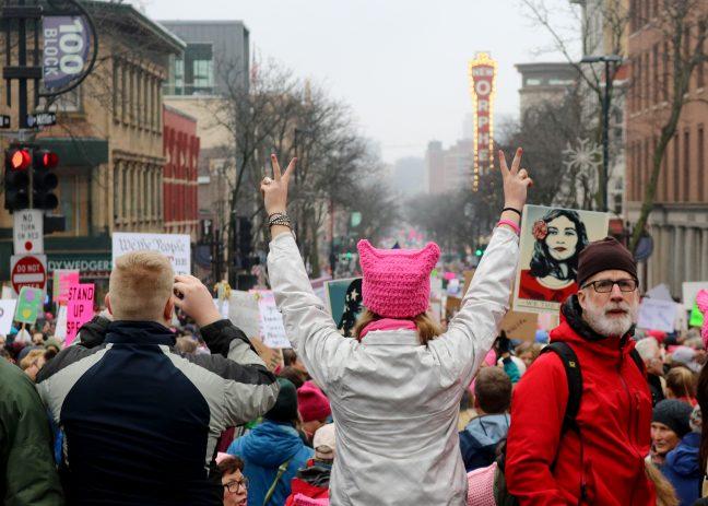 In Photos: 100,000 gather to march in solidarity, sisterhood