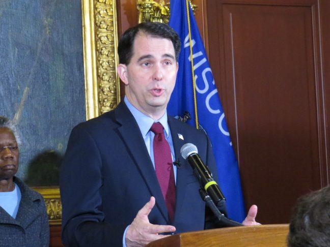 Walker brings carrot and stick approach to welfare
