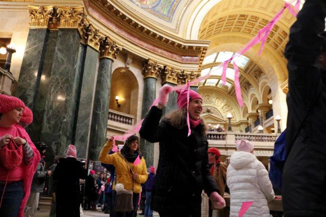 Madison+community+uses+1%2C800-foot+pink+ribbon+to+show+commitment+to+resistance+movement