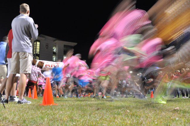 Behind the Lens: Photographer captures runners race by the Light of the Moon