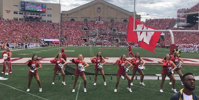 The first Badgers trickle into lines waiting to start the football game.