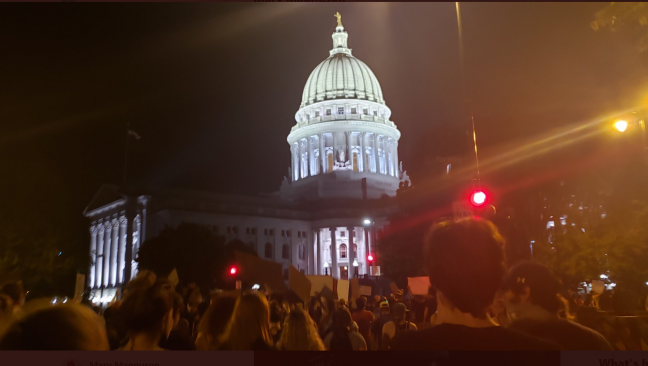 Protestors+head+back+up+E.+Washington+to+the+Capitol.+