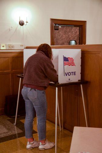 Archival photo of student voting on campus, November 3, 2020.