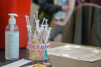 Bottle of syringes used to carry Moderna vaccine. April 22, 2021.