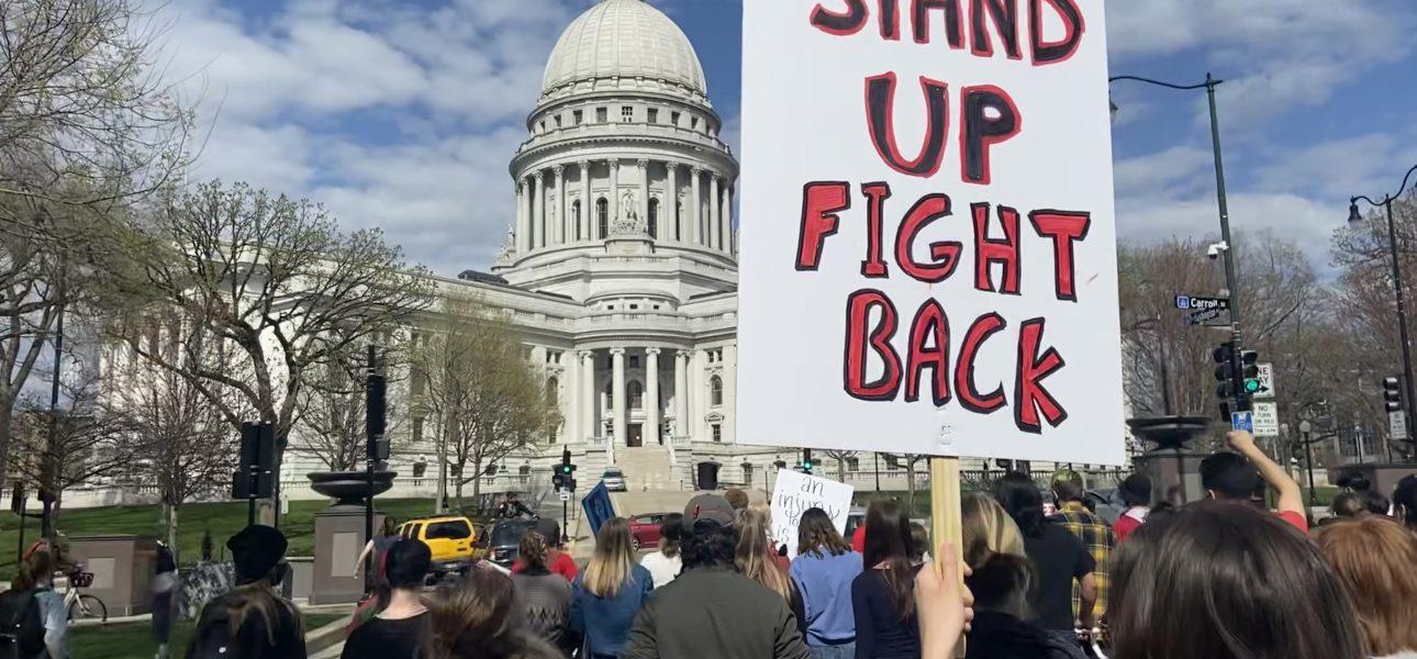 Protesters march toward state capitol in march led by the BIPOC Coalition following the police shootings of Adam Toledo and Daunte Wright last week