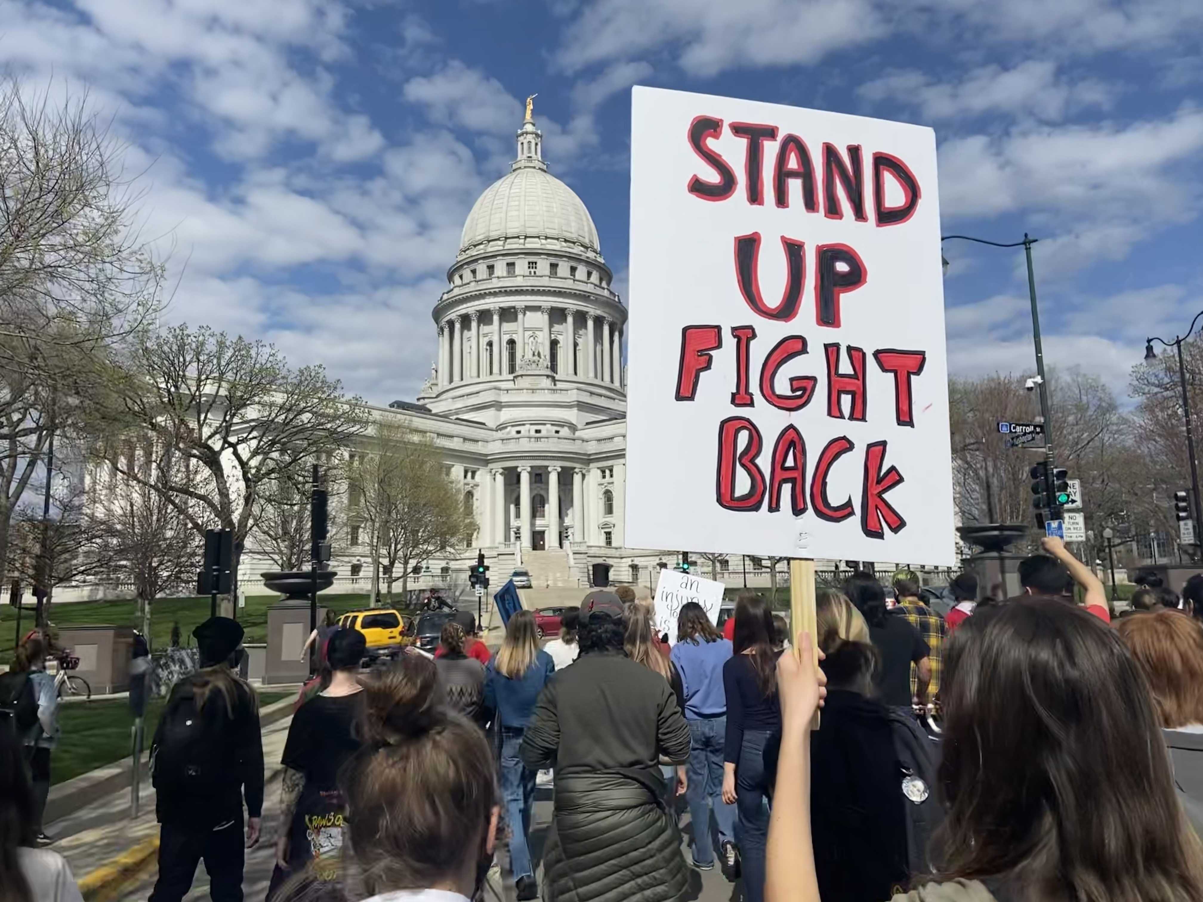 Protesters march toward state capitol in march led by the BIPOC Coalition following the police shootings of Adam Toledo and Daunte Wright last week
