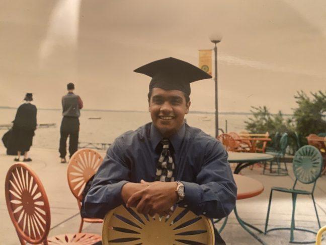 Manu+Raju+at+the+Wisconsin+Union+Terrace+on+his+graduation+day%2C+2002