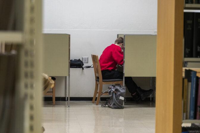 Badger Herald archival photo of a UW student studying. February 26, 2022. 
