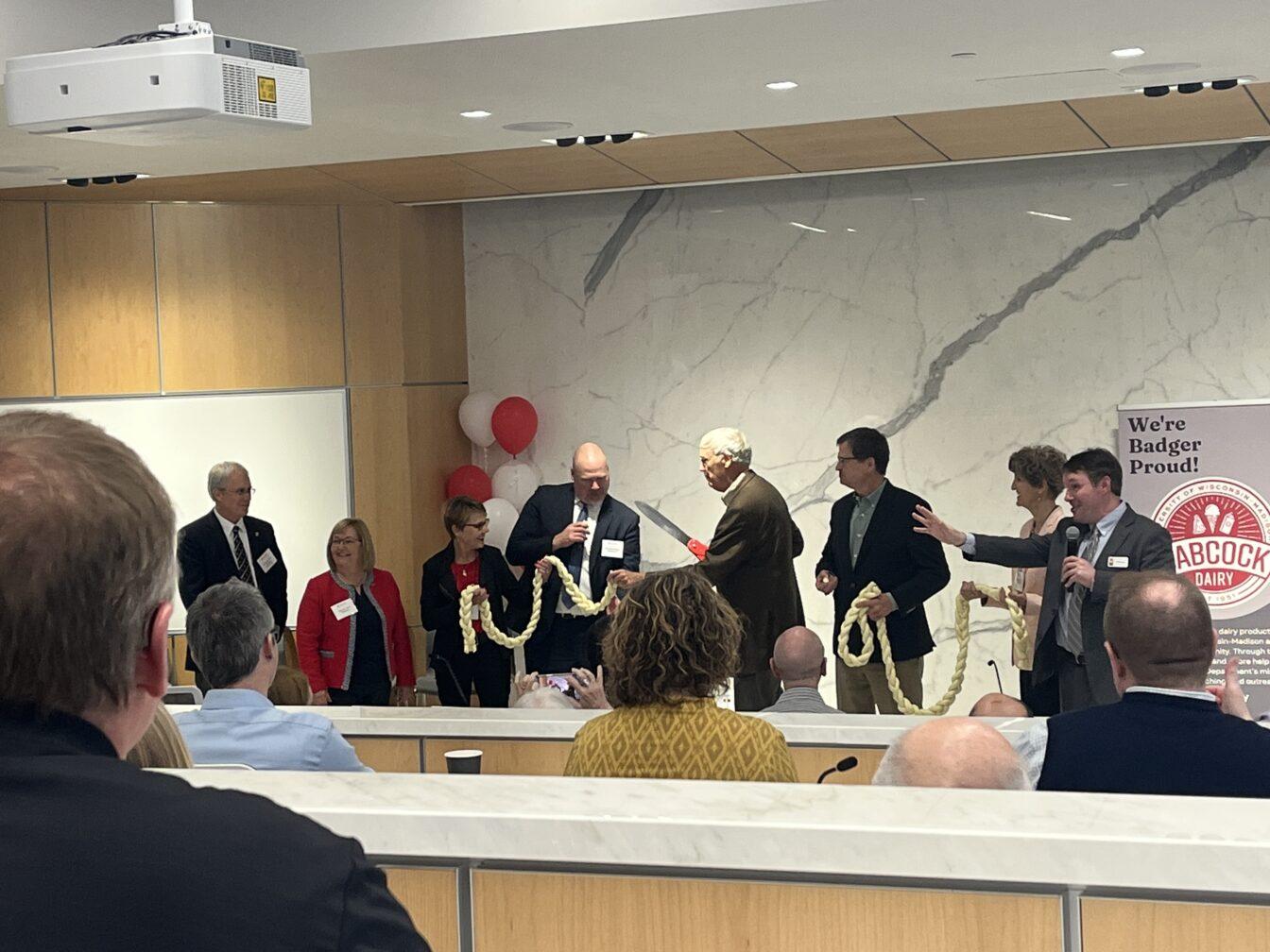 Babcock Dairy Hall celebrated its finished facility renovations with a braided mozzarella cheese ribbon ceremony