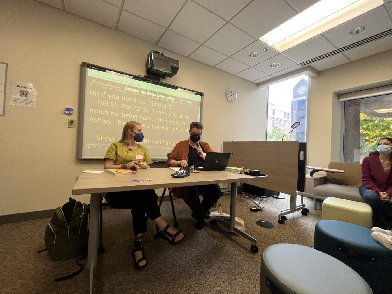 Author of Against Technoableism: Rethinking Who Needs Improvement” Ashely Shew (left) leads discussion on her books themes and recognizing technoableism in todays society.