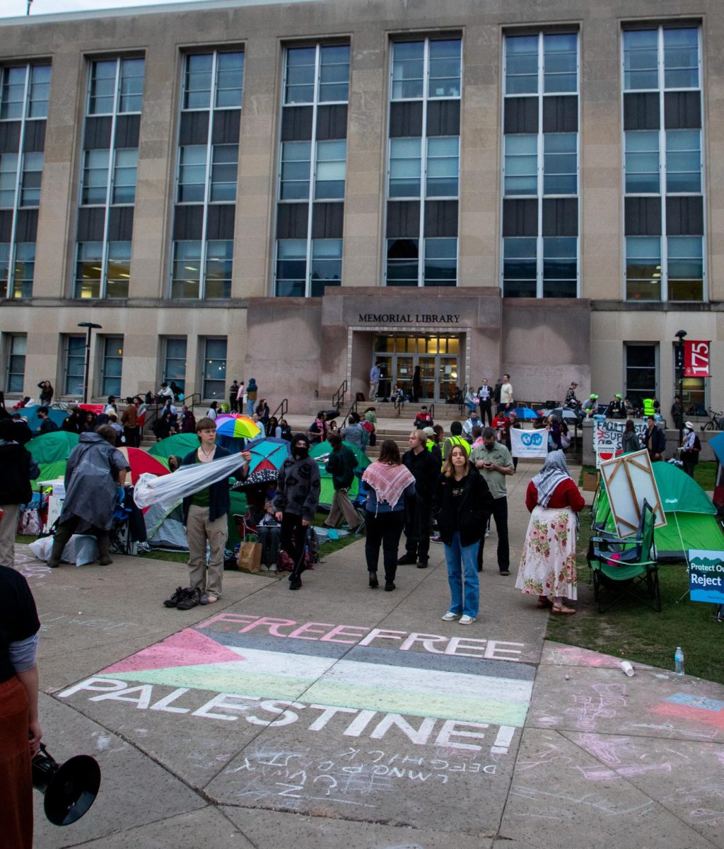 A chalking at the Library Mall encampment reads Free Free Palestine! April 30. 2024.