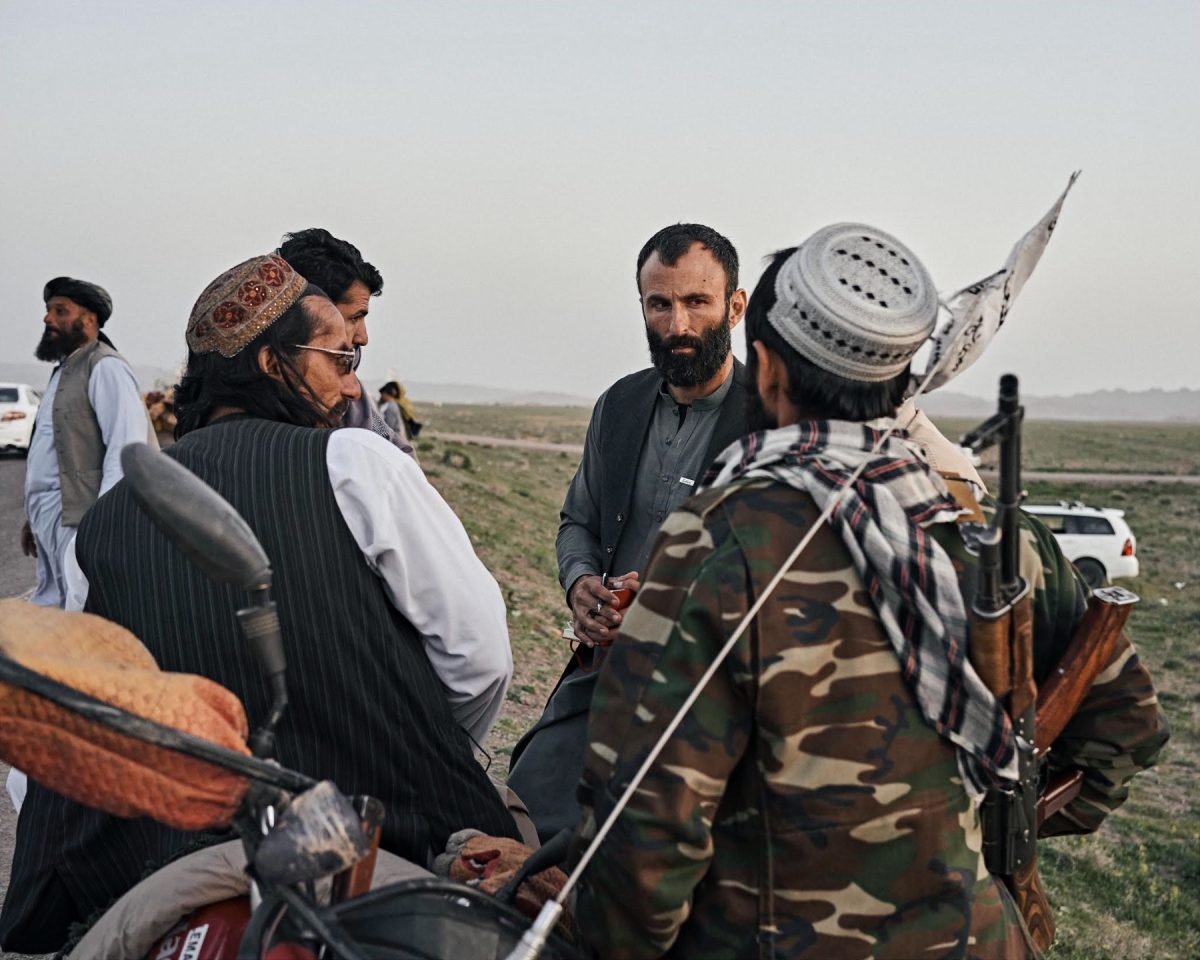 International+journalist+Jason+Motlagh+interviewing+Taliban+fighters+in+Afghanistan.+Photo+courtesy+of+Jason+Motlagh.