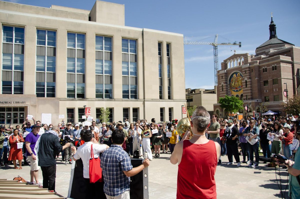 Staff, students, and community members gather at the Library Mall encampment during the faculty walk out on May 6, 2024.