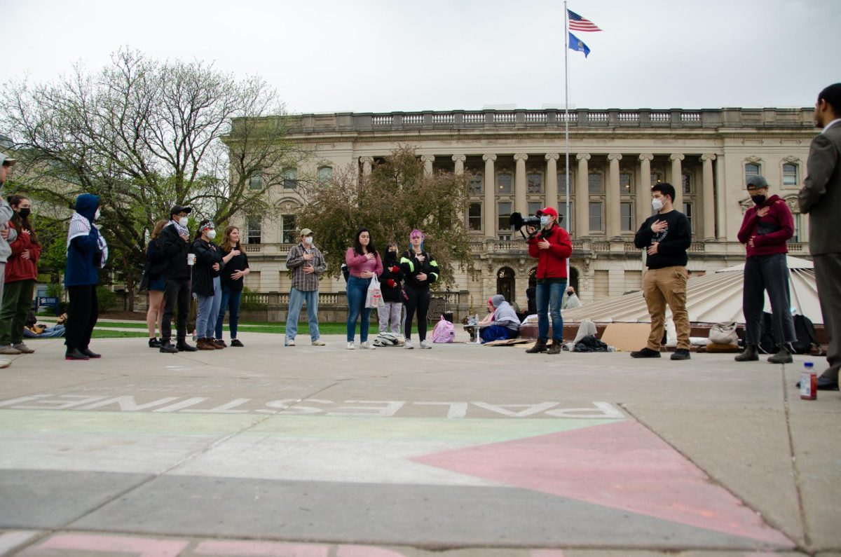Demonstrators learn about breathing techniques at a teach-in at Library Mall on May 2, 2024.