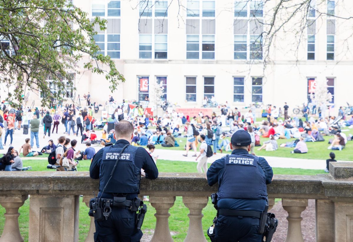 Police officers watch over the demonstrations. May 1st, 2024. 
