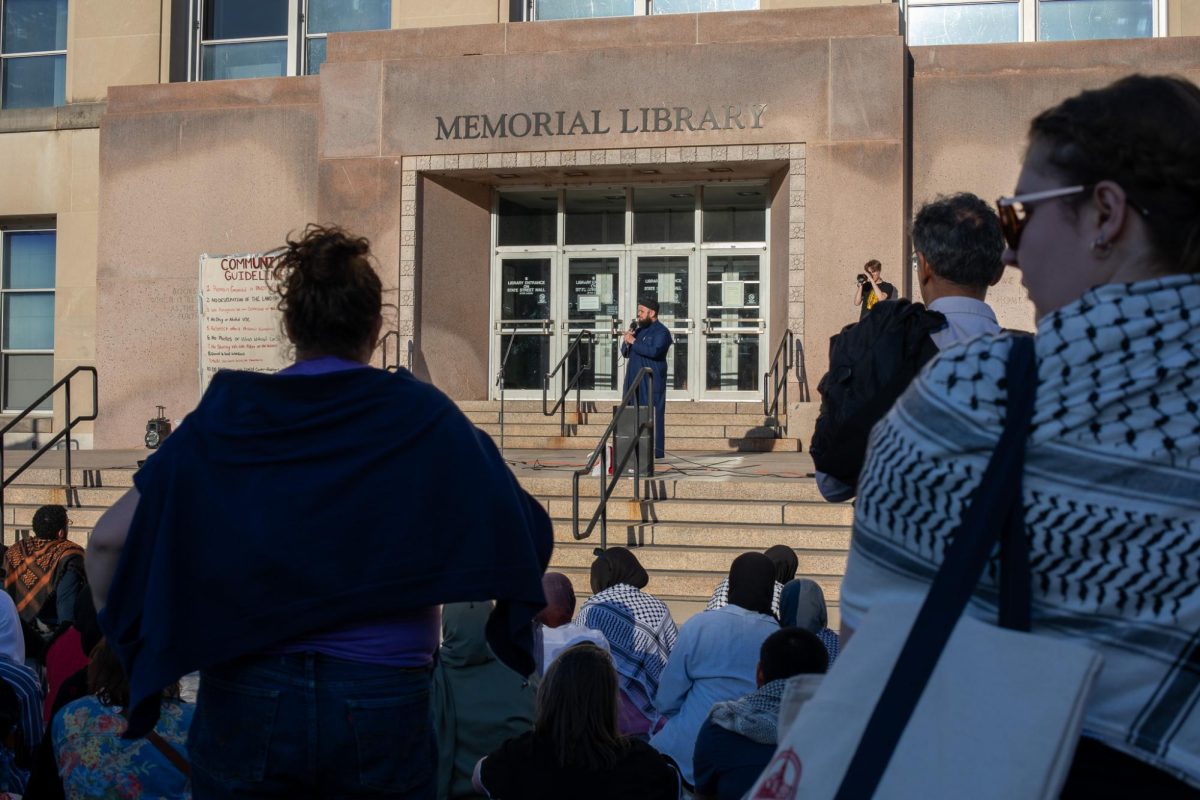 Protesters listen to Sheikh Rami on fifth day of encampment demonstration at UW. May 3, 2024.