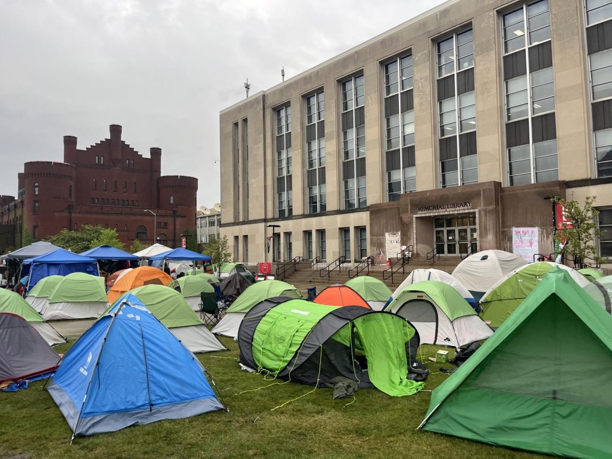 Day nine of the encampment demonstration on Library Mall begins with rainfall. May 7, 2024. Photo by Cat Carroll, The Badger Herald.
