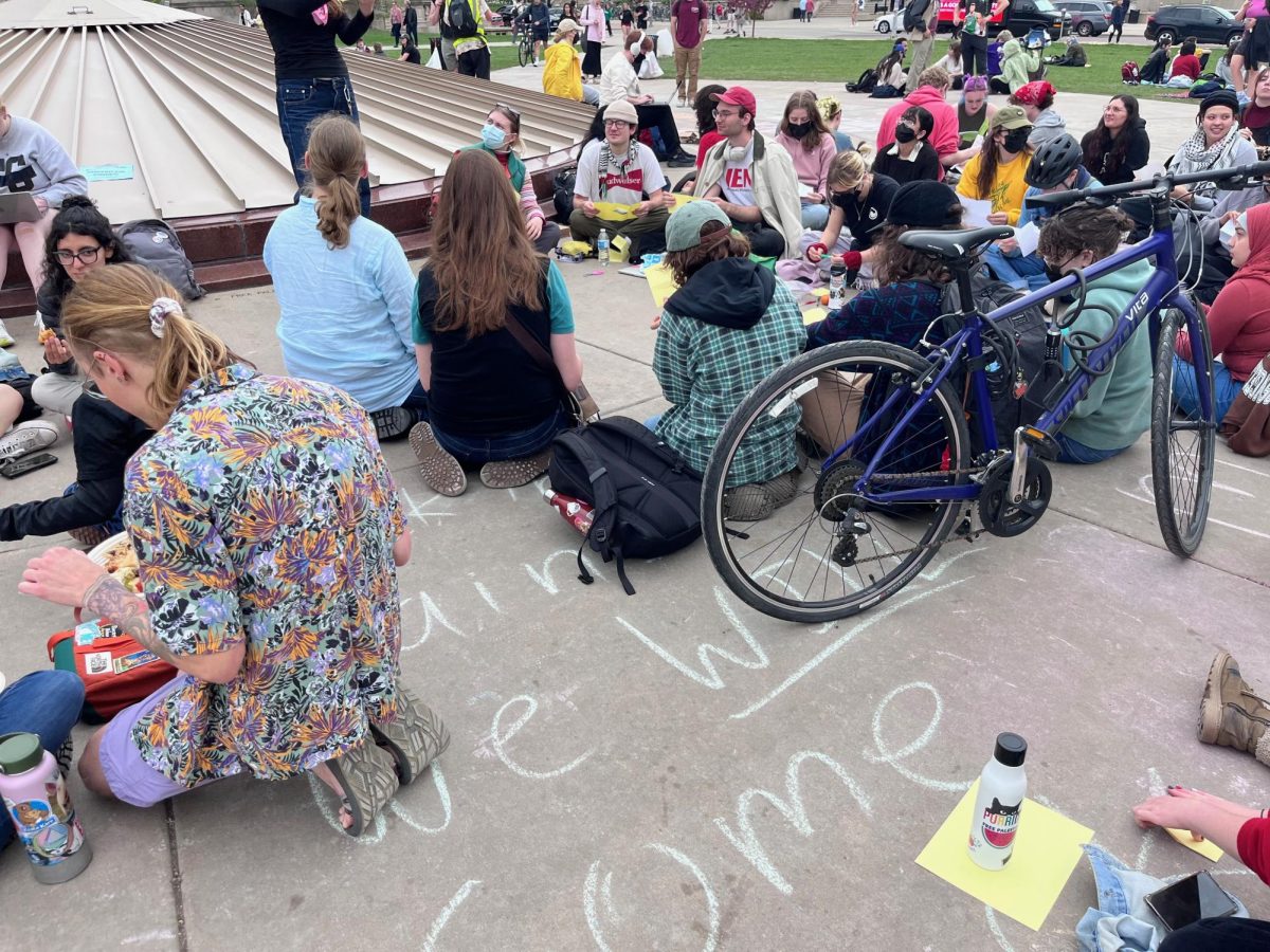 Protesters at the encampment demonstration on Library Mall take part in a zine-making workshop. May 2, 2024.