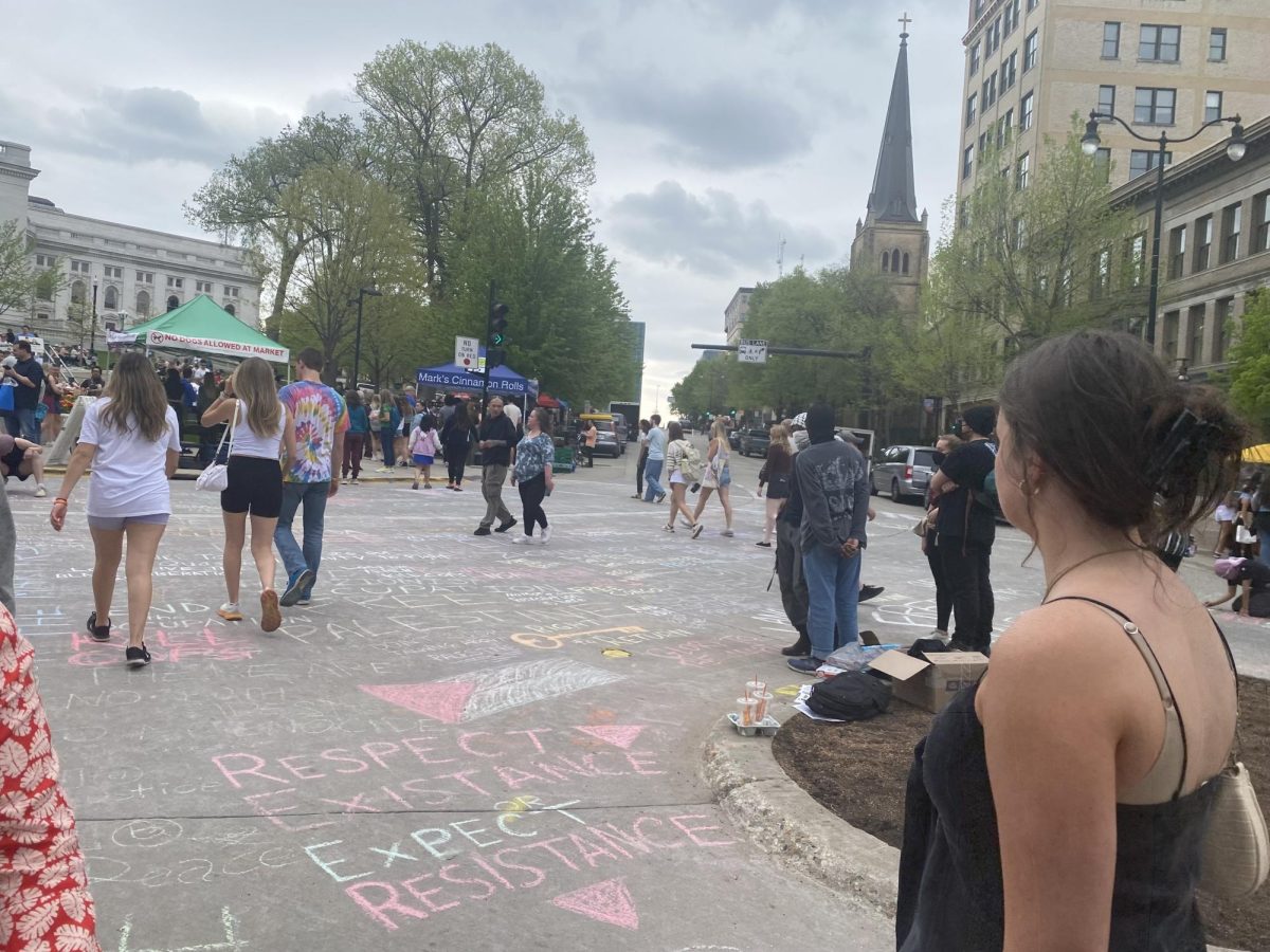 Pro-Palestine chalkings were on the street near the Wisconsin State Capitol during the Dane County Farmers Market. May 4, 2024.