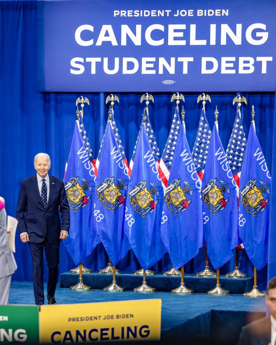 President Joe Biden enters the stage where he proposes his student debt cancelation plan in Madison. March 8, 2024. 