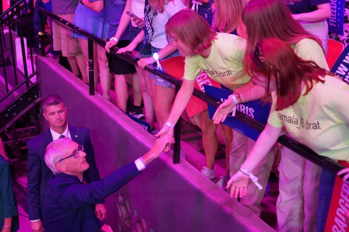 Governor Tony Evers greets rally goers wearing "Kamala is brat" merch, September 20th, 2024