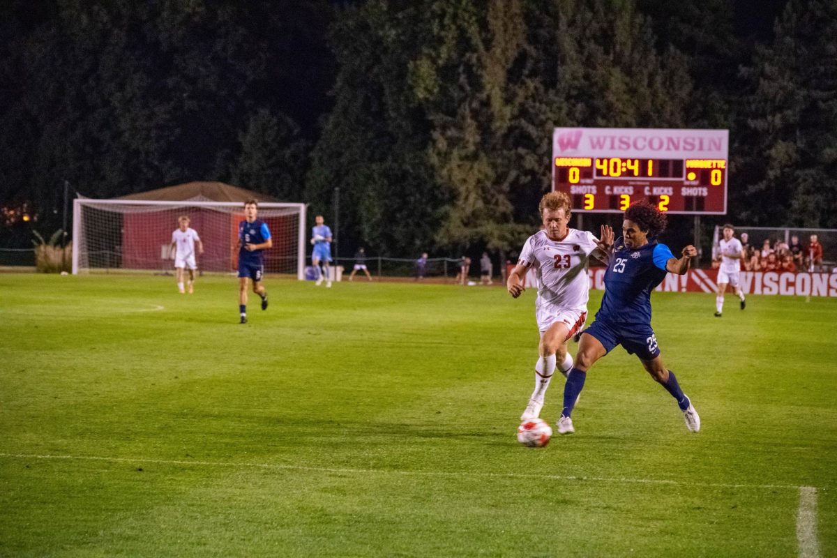 Will Smith swats away a defender in their match against Marquette.