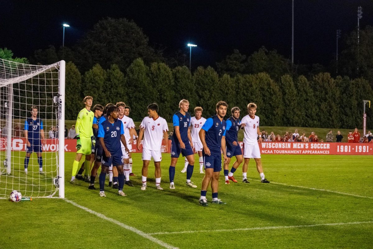 Badgers get set up for a corner.