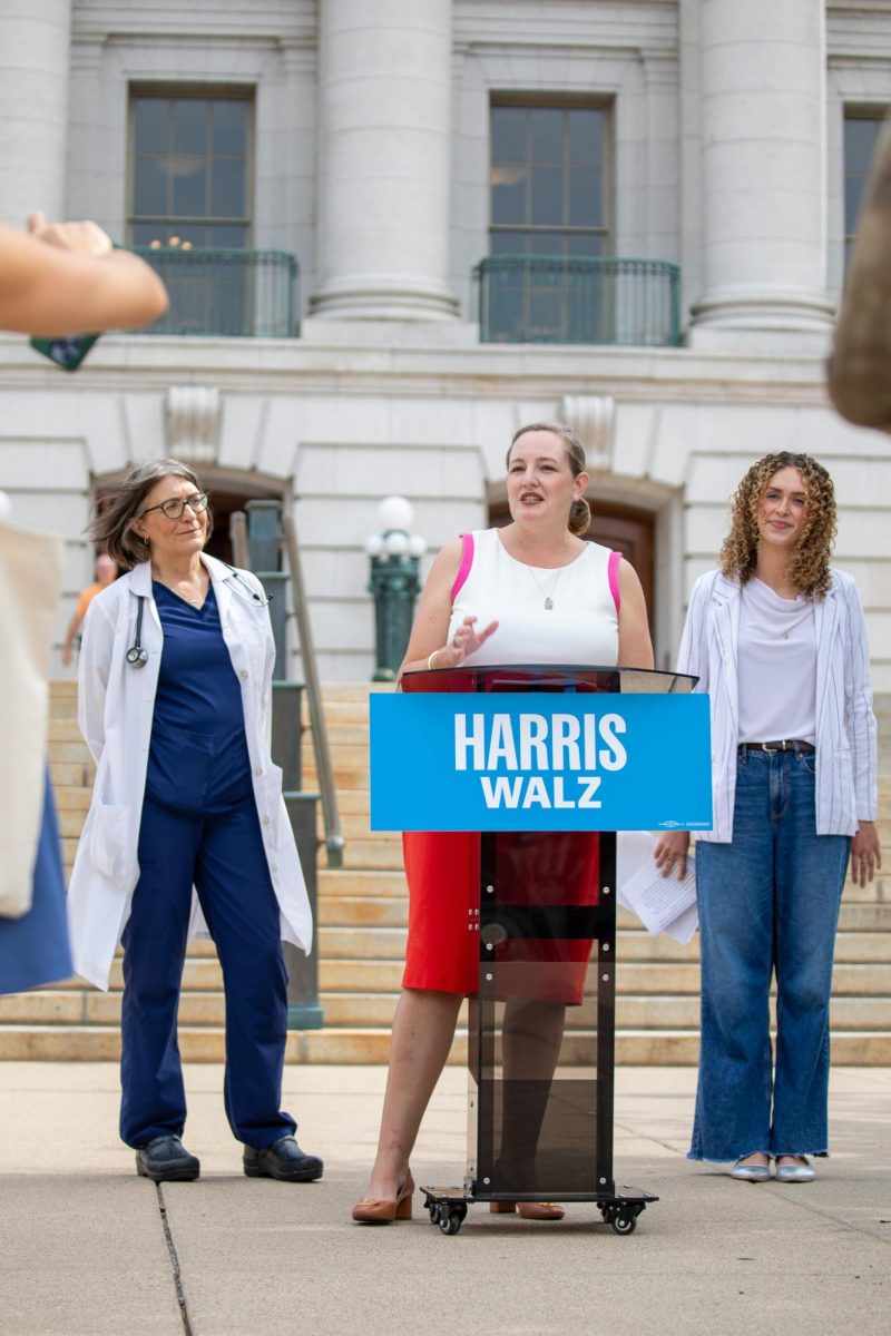 State Senator Kelda Roys (center) and local health care advocates rally against Trump's plans to repeal the Affordable Care Act. September 16th, 2024.