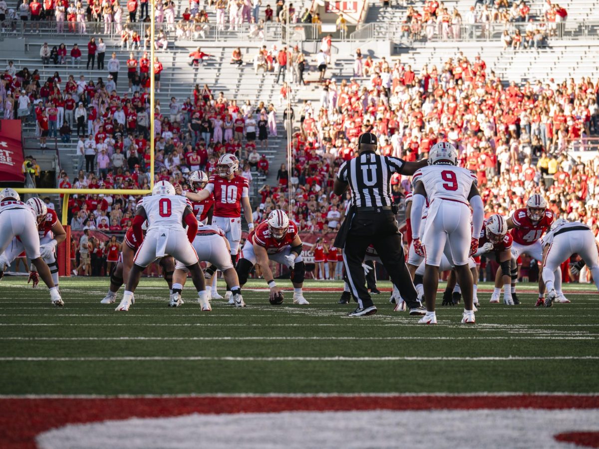 The Badger offense lines up against the South Dakota defense just past midfield. Sept. 7, 2024. 