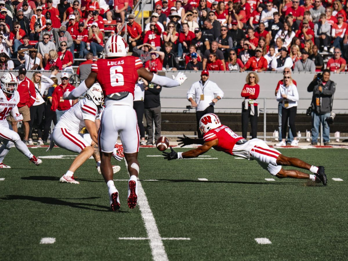 A badger player dives on the ball following a muffed punt return. Sept. 7, 2024. 