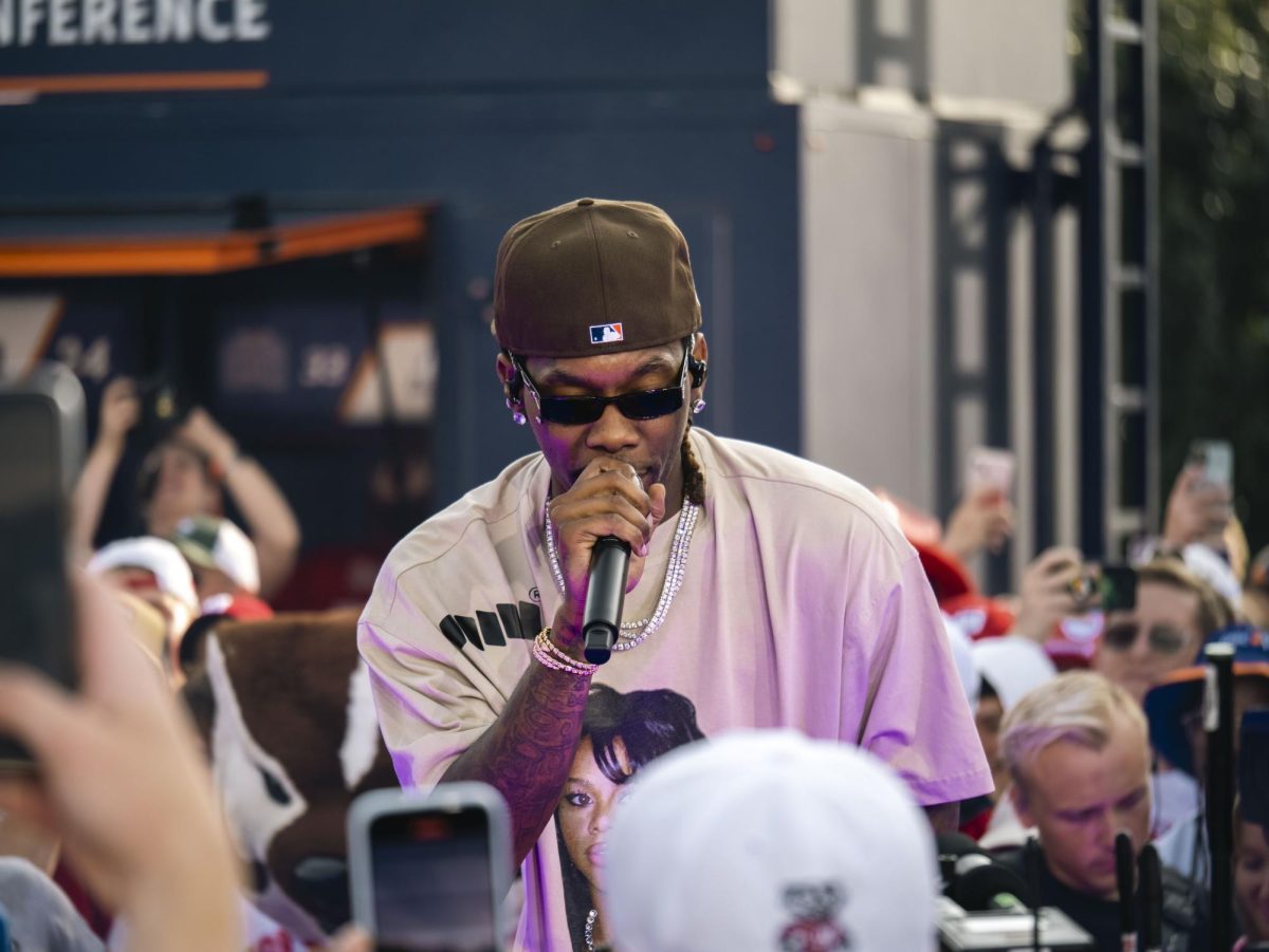 Offset performing at the Fox Big Noon Kickoff event on the Kohl Center lawn. 