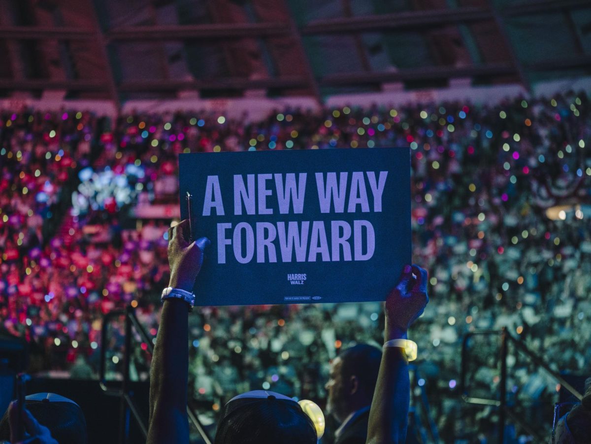 Audience member holds a sign at the Kamala Harris rally in Madison. September 20, 2024.