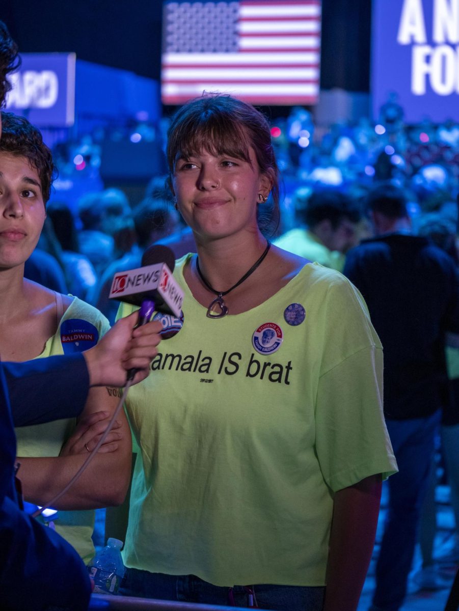 Crowd member wearing a Kamala is Brat t-shirt at the Madison rally. 