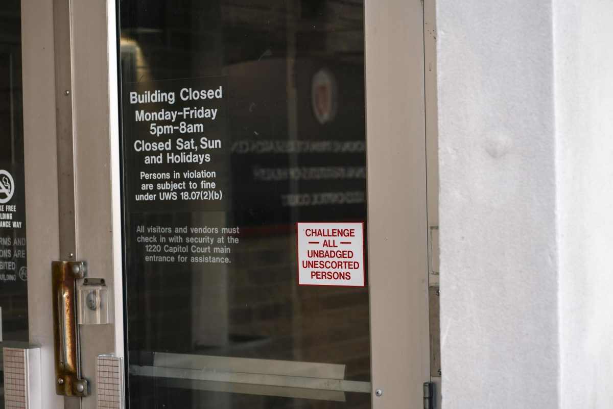 Sign on the locked door of the Wisconsin Primate Center Harlow Lab. 