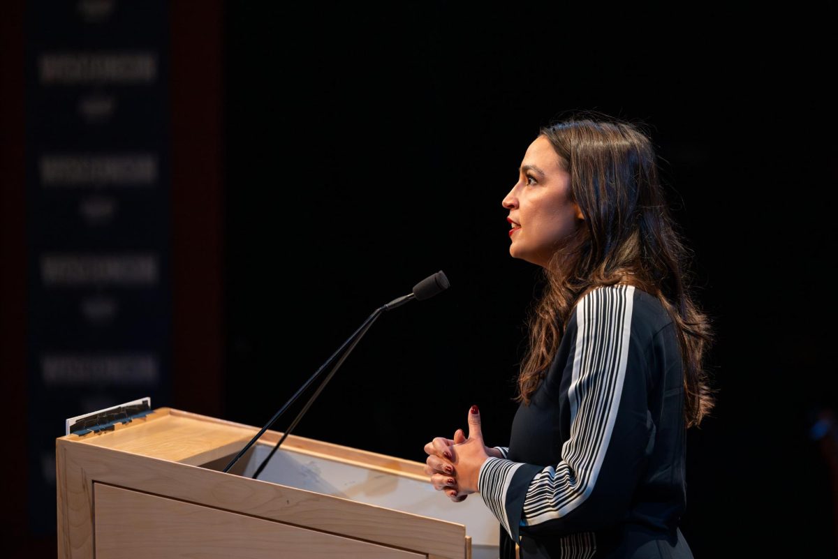 Representative Alexandria Ocasio-Cortez speaks at a Harris-Walz campaign event. October 28, 2024.