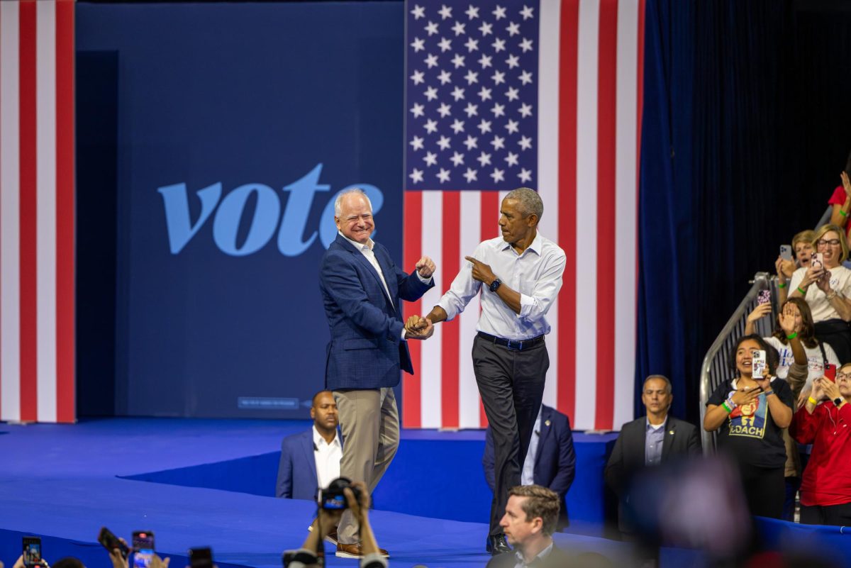 Former President Barack Obama and Tim Walz at a Harris Walz Campaign event. October 22, 2024