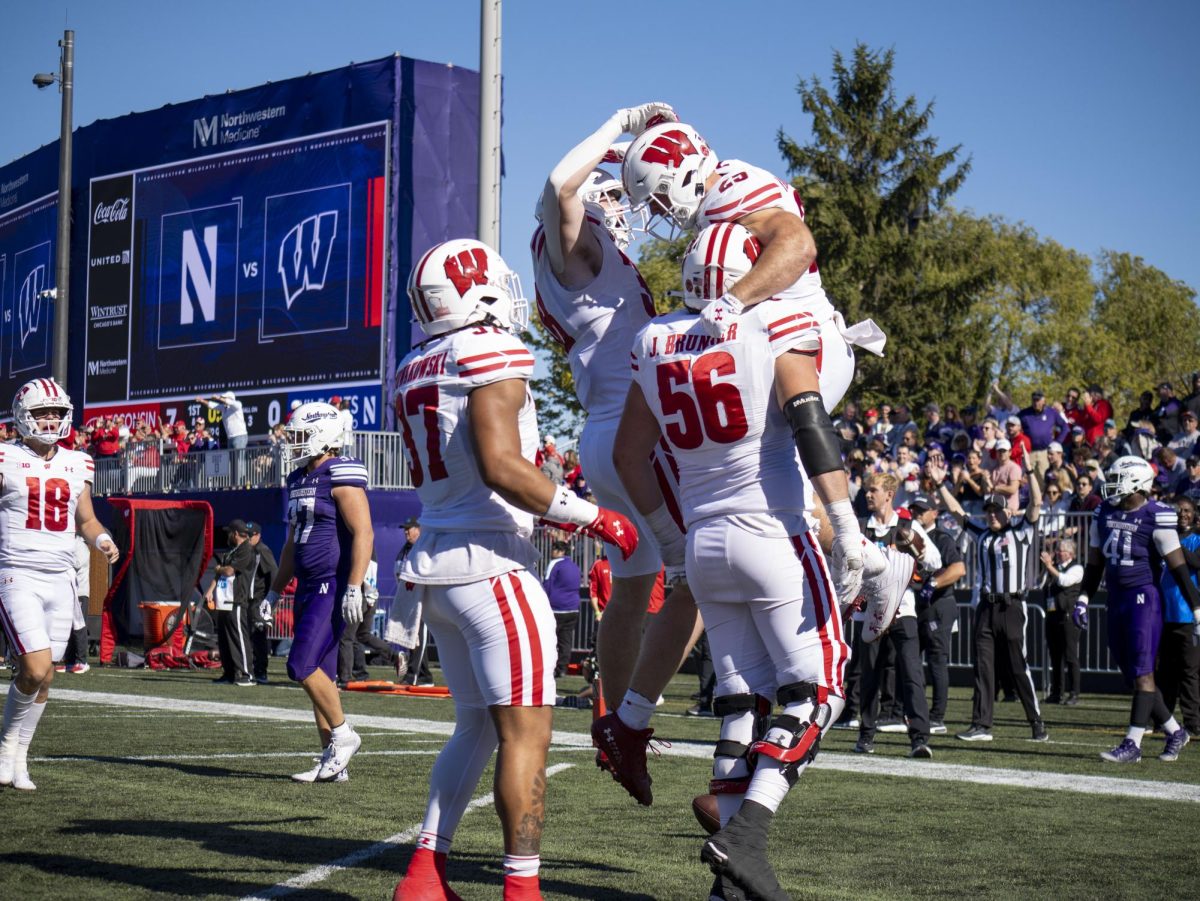 Badgers celebrate after a rushing touchdown. October 19, 2024. 