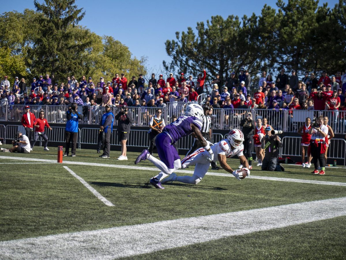 Badgers player unsuccessfully attempts to catch a touchdown pass. 