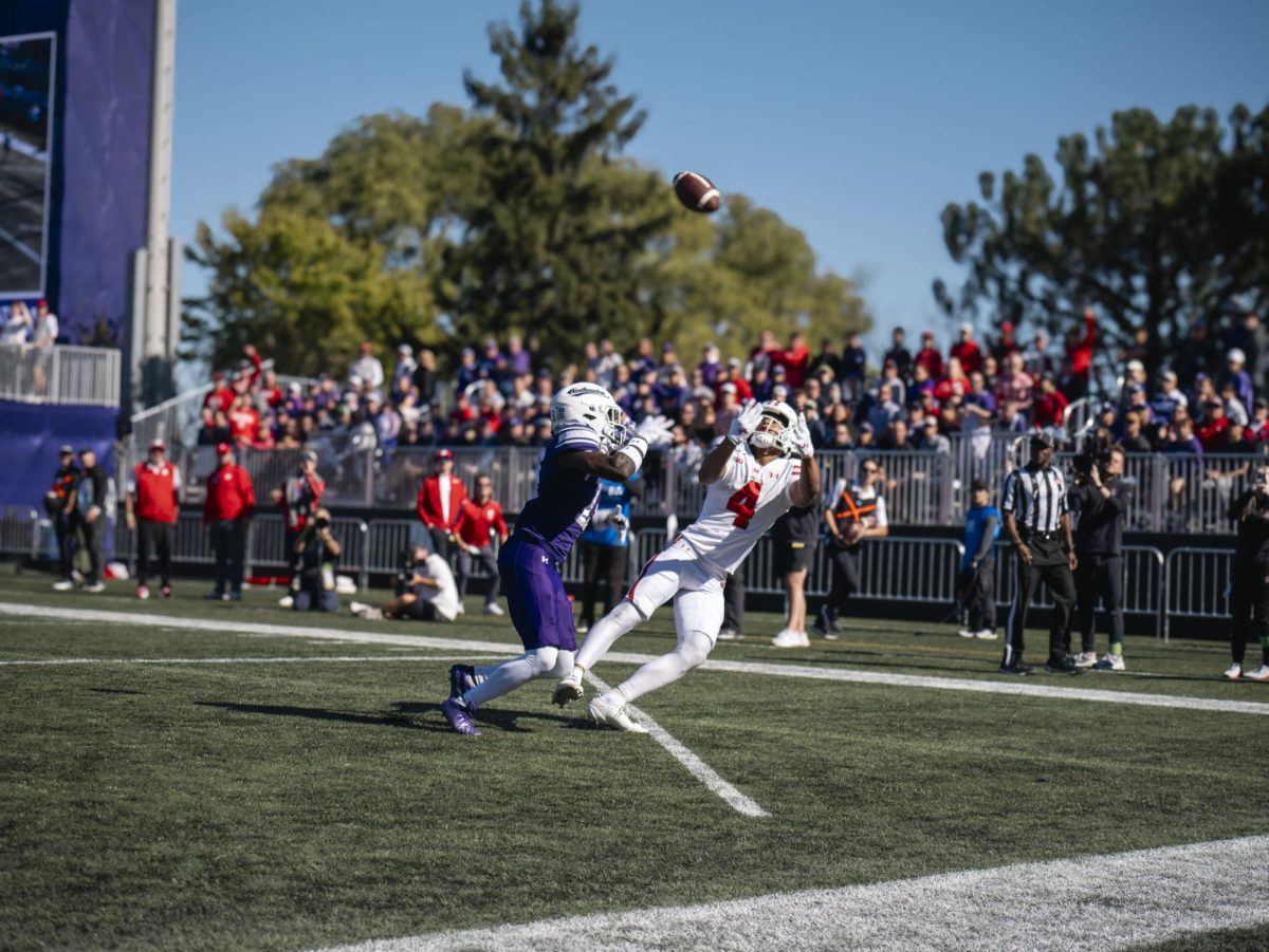 Badgers player unsuccessfully attempts to catch a touchdown pass. 