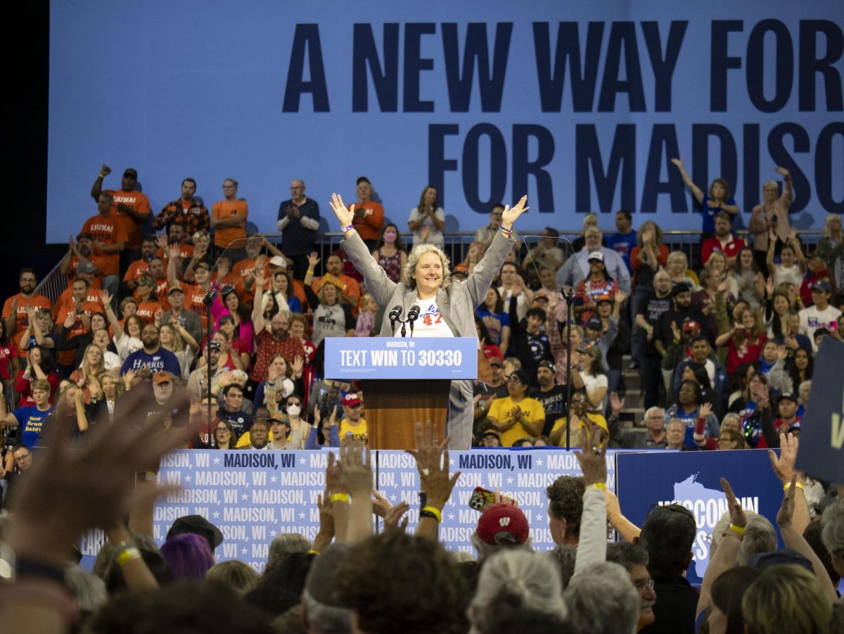 Satya Rhodes Conway gestures at the Harris campaign event. 