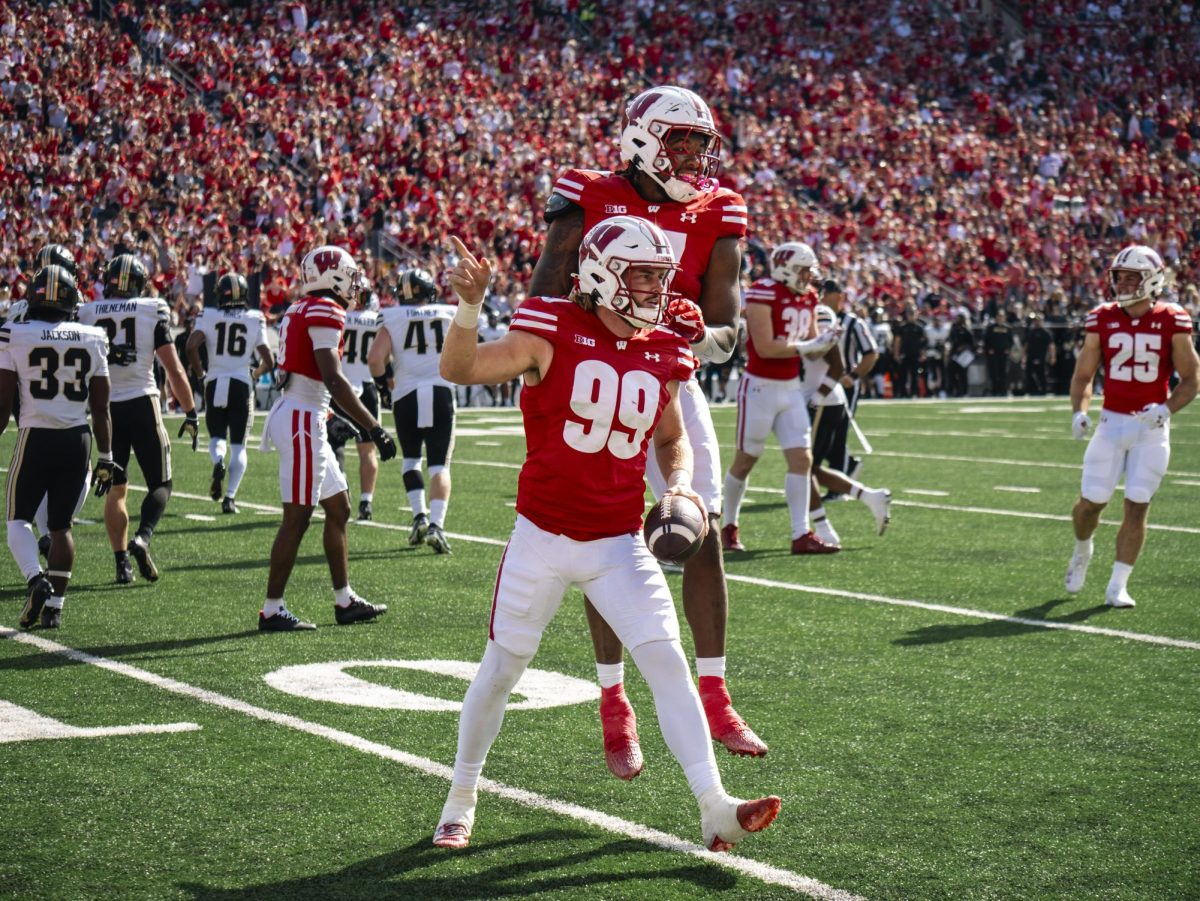 Badger players celebrate after a recovered fumble. October 5, 2024. 